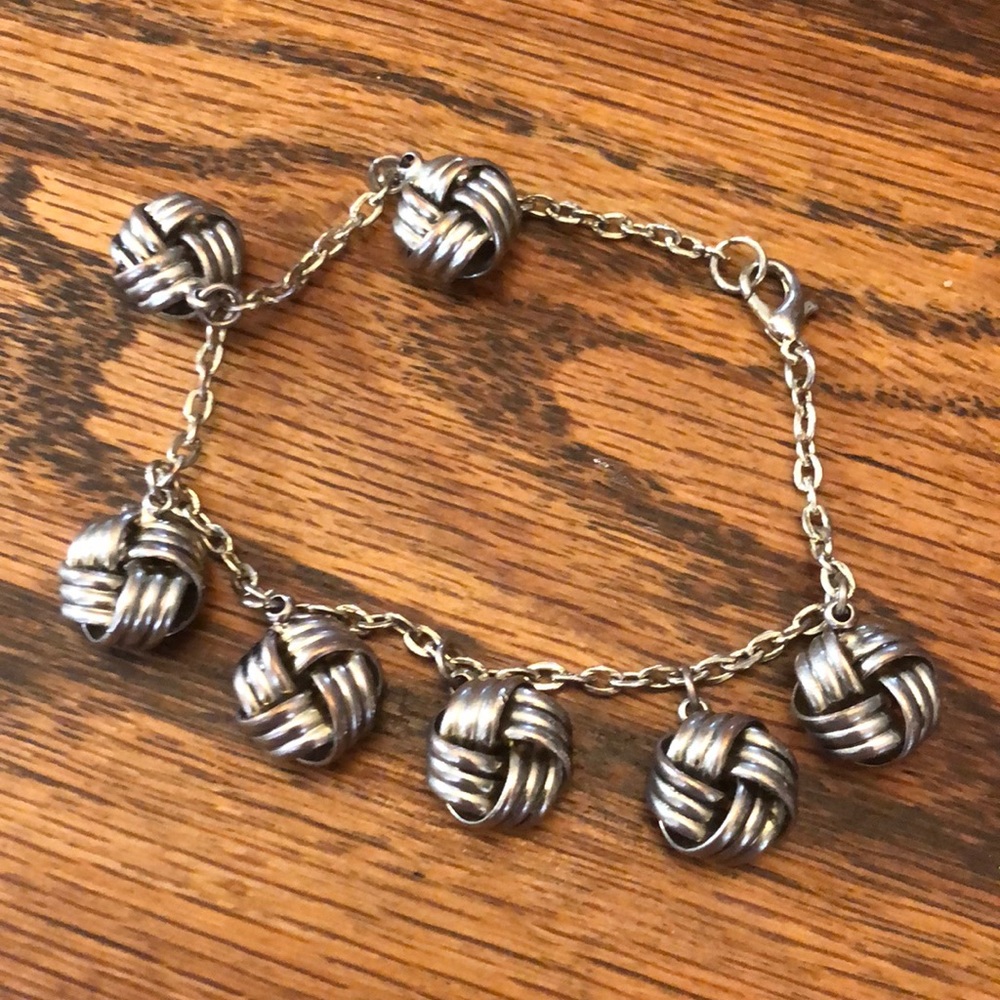 Charm bracelet W/ bow design stainless steel charm
